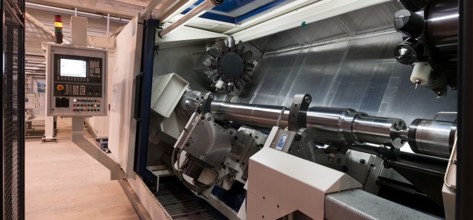CNC machining tool. Modern industrial computer controlled lathe.
